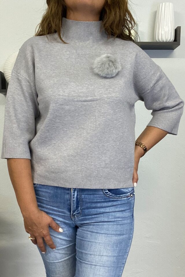 Γυναικεία πλεκτή μπλούζα με καρφίτσα